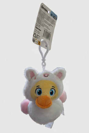 Plush toy with a tag on a light gray background