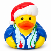 Mini christmas festive jumper rubber duck on a white background