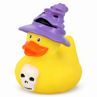 Mini halloween skull witch rubber duck on a white background
