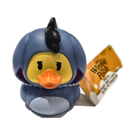 Eeyore Duckalooz rubber duck with attached Winnie the Pooh product tag on white background